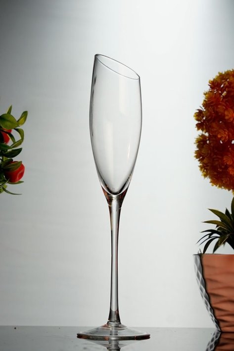 Empty Chopped Flute Champagne Glass in a White Background