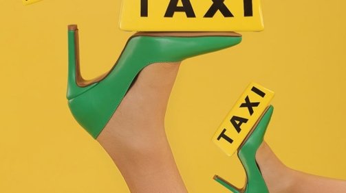 Five feet of women models wearing green heels displayed on a yellow background