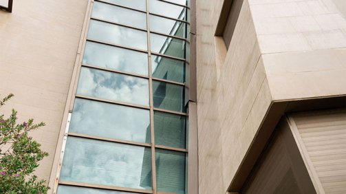 bottom view of a luxurious stone cladded villa