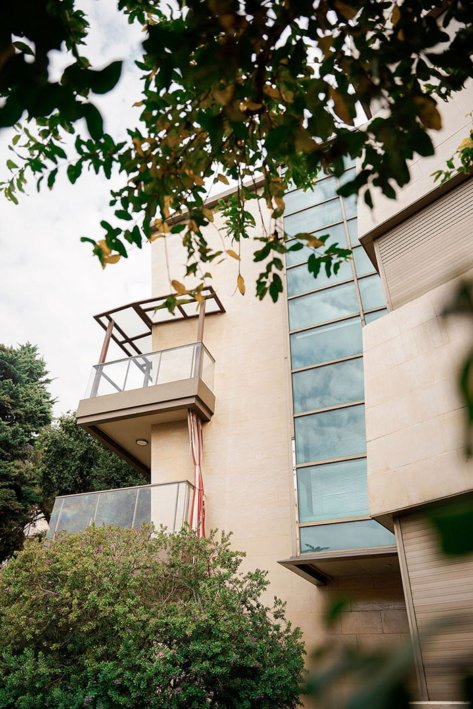 Side view of a luxurious stone cladded villa