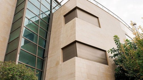 Side view of a luxurious stone cladded villa