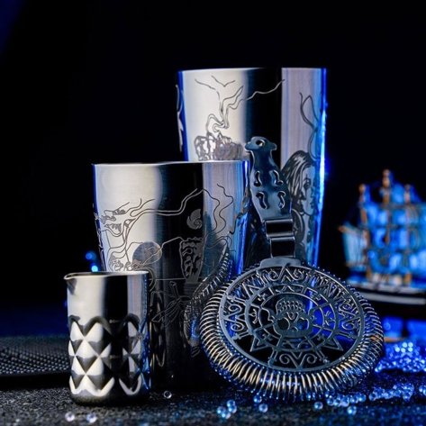 Three piece special bartending cocktail set of a Hawthorne strainer, jigger and Boston shaker