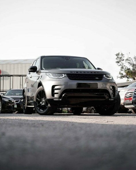 Discovery Jeep in a Car Dealership Background