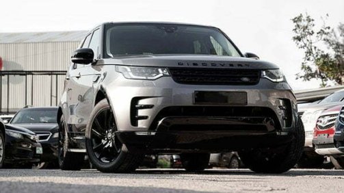 Discovery Jeep in a Car Dealership Background